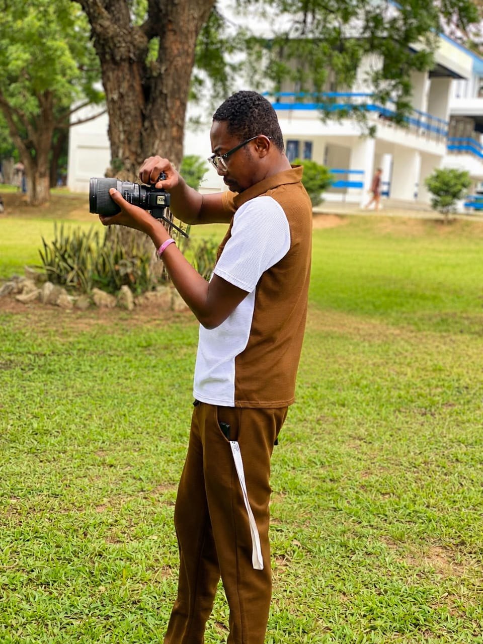 Camera operator filming on location